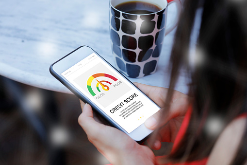Smart Phone Showing Credit Score On A Screen